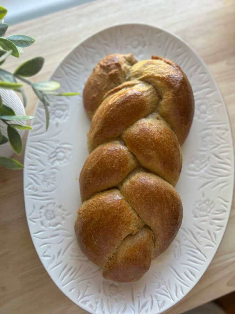brioche bread made with freshly milled flour on a white plate