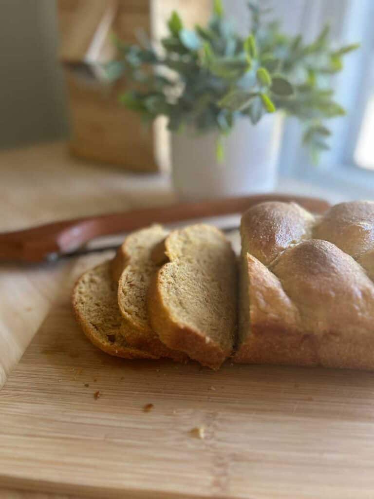 fluffy brioche bread sliced to show the beautiful crumb