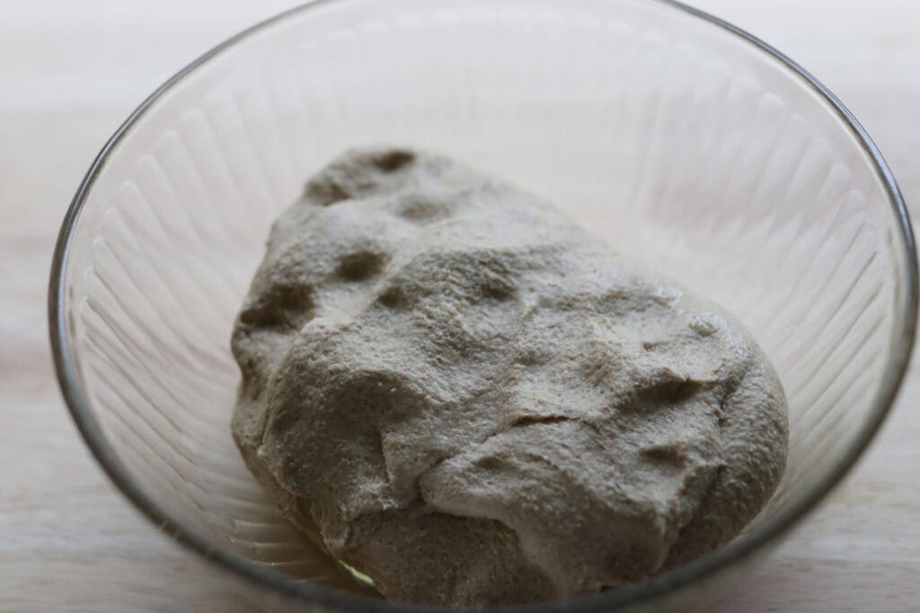 pretzel bun dough in a bowl
