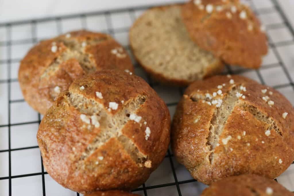pretzel buns on wire rack
