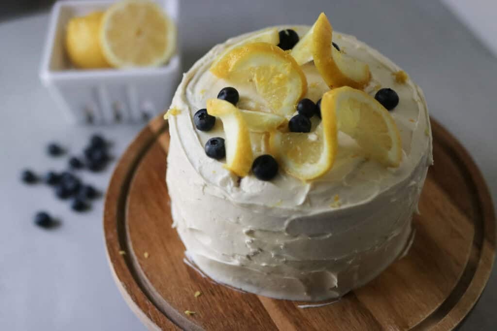 delicious fresh milled lemon blueberry cake on wooden platter