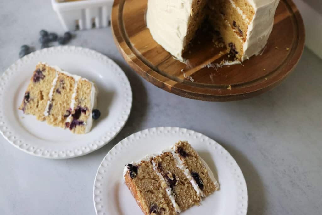 sliced lemon blueberry cake on plates