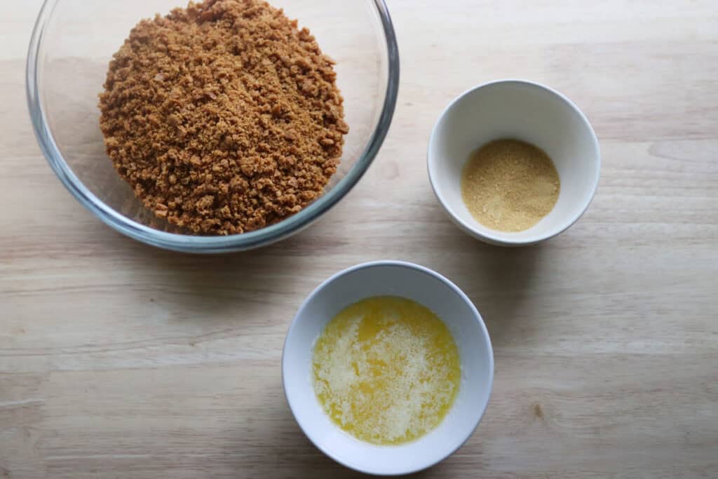 the ingredients for a freshly milled graham cracker crust