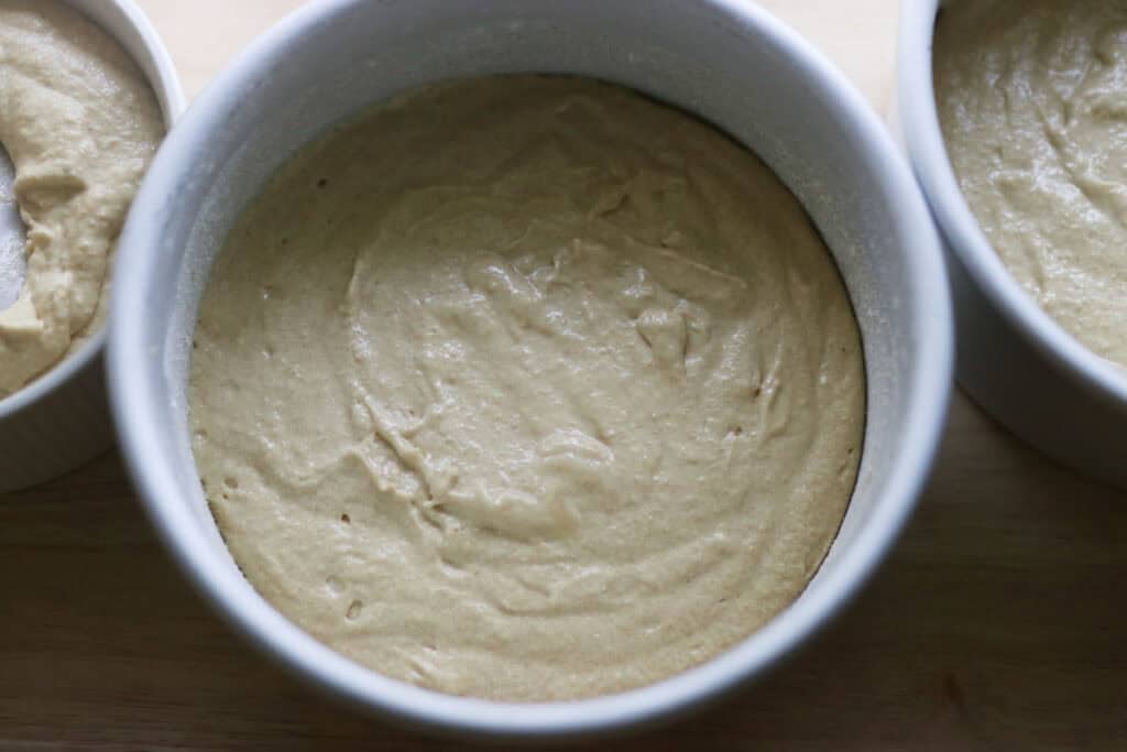 cake batter in cake pans