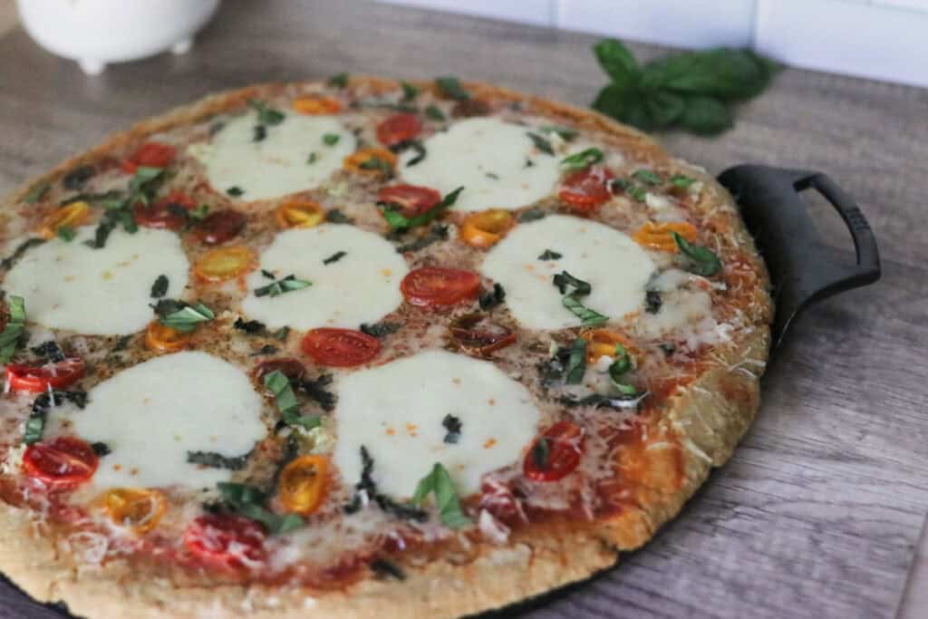 baked sourdough pizza with mozzarella slices
