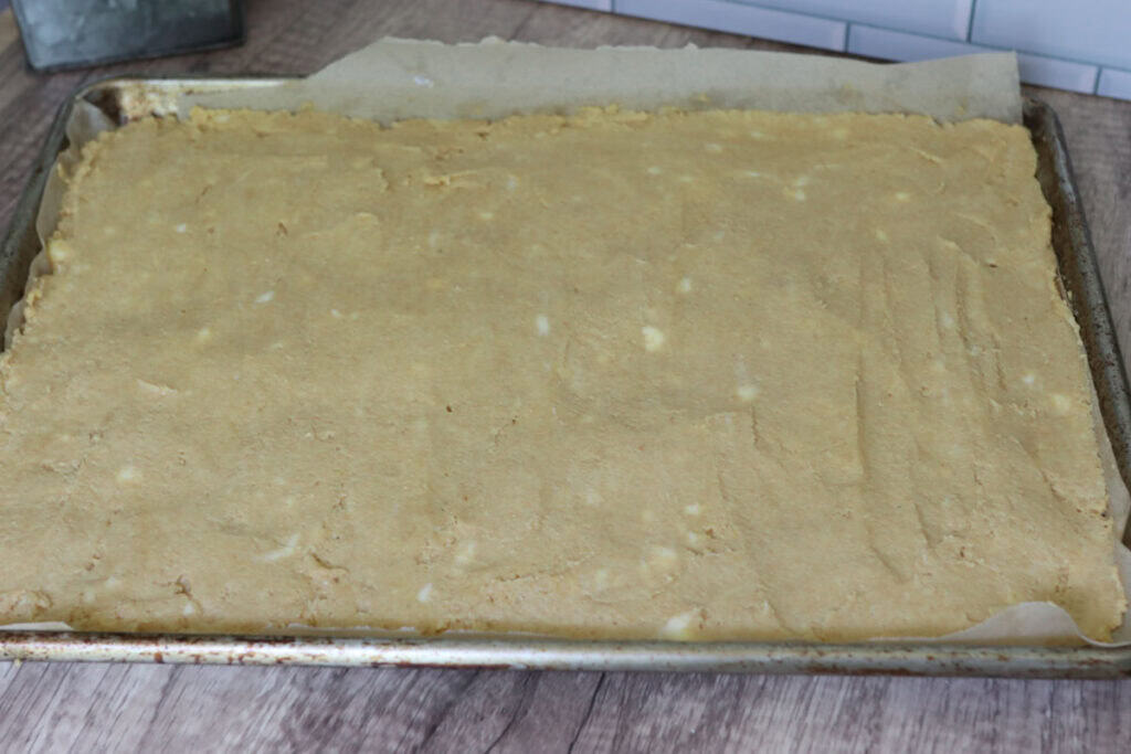 shortcake batter that has been pressed into a sheet pan