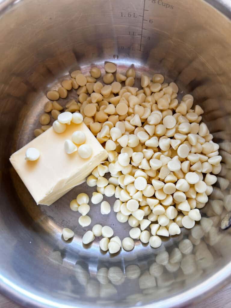 white chocolate chips in large pot