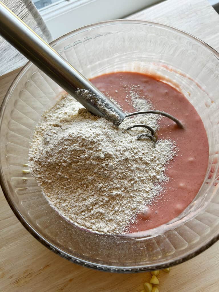 strawberry brownie batter with flour on top