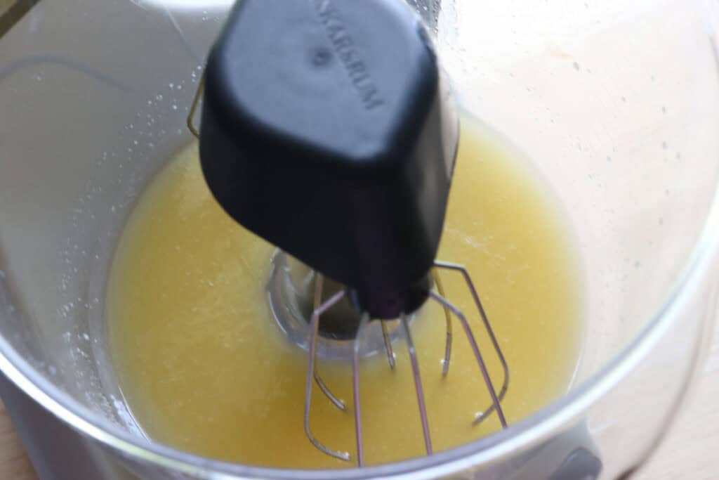 honey and butter in a stand mixer to make fresh milled sourdough banana crumble muffins