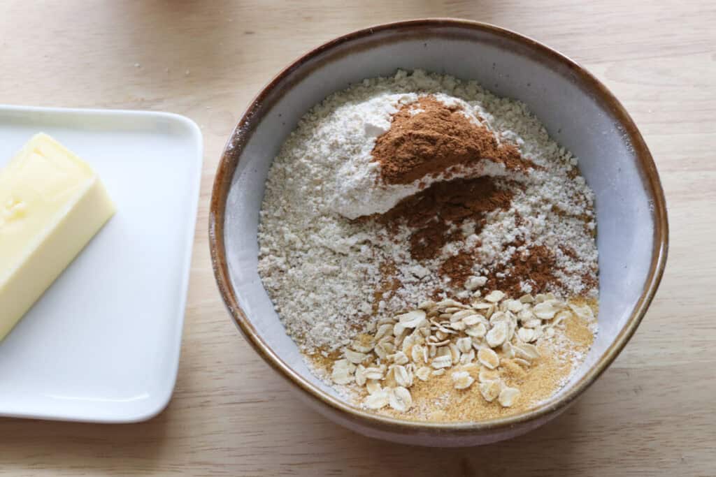 flour, cinnamon and sugar in a bowl for fresh milled sourdough banana crumble muffins