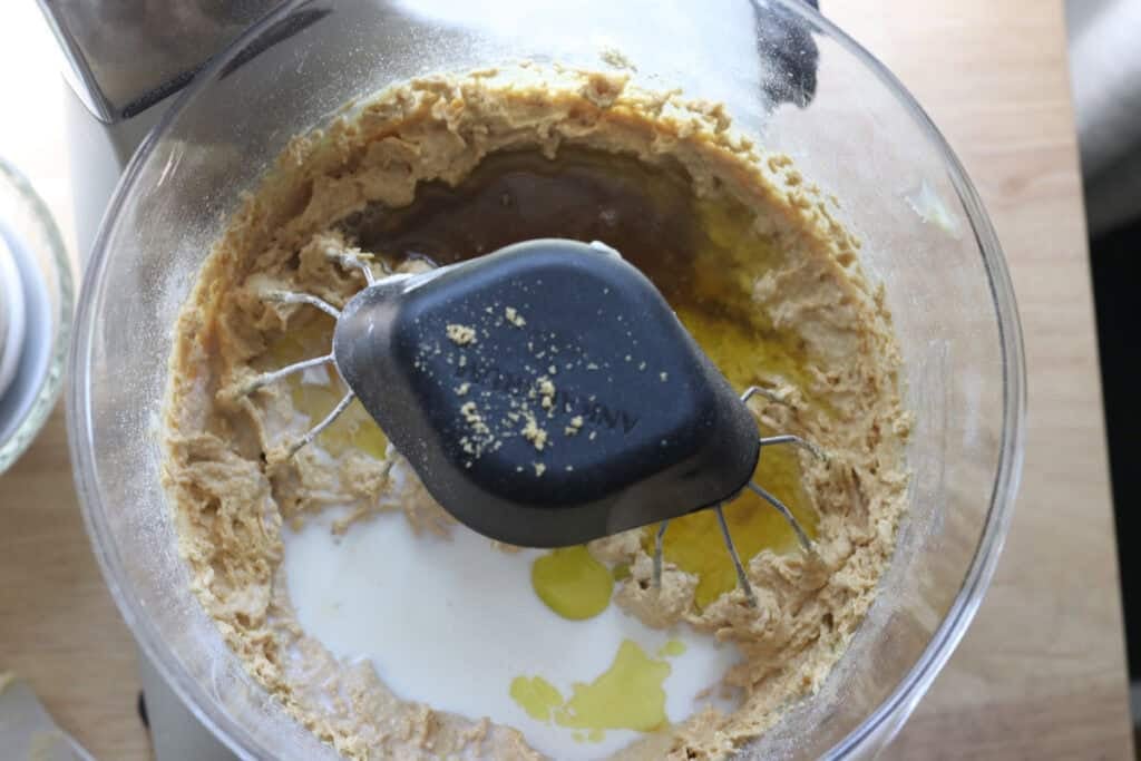 the lemon juice, milk, and oil added to the cake batter for the freshly milled lemon chantilly cake