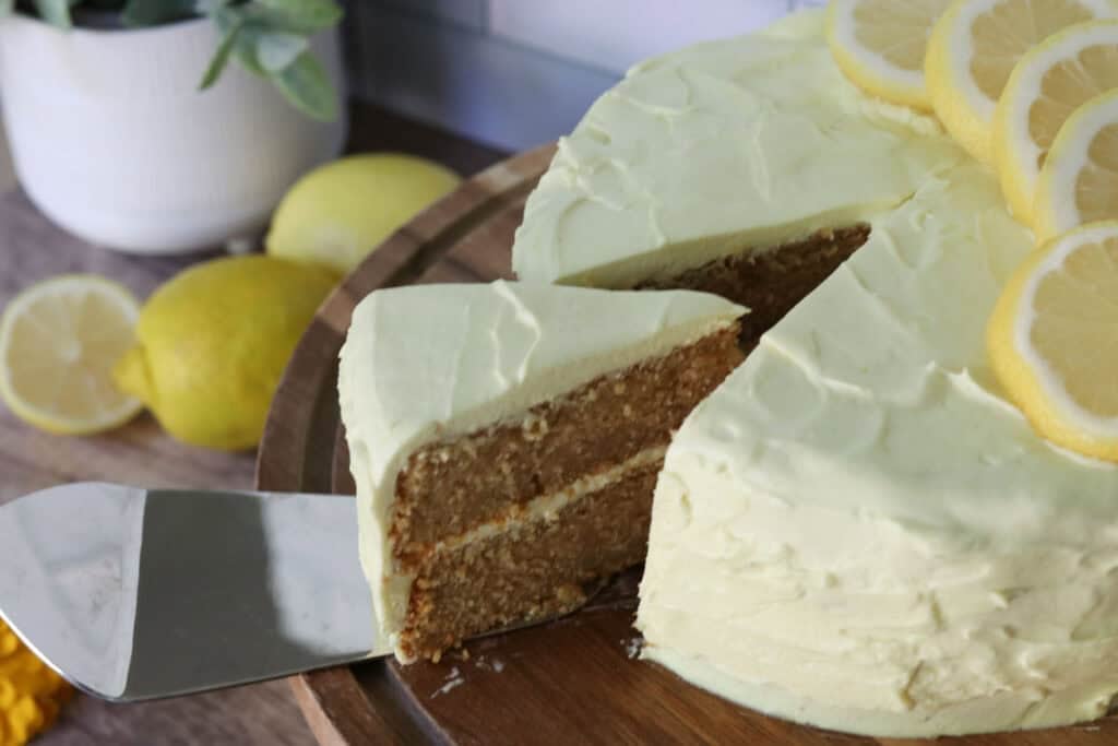 a slice of freshly milled lemon chantilly cake on a pie server