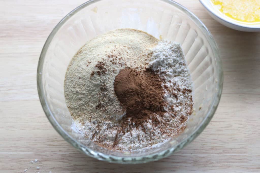 cinnamon, sugar, and flour in a bowl for the streusel topping for freshly milled apple cinnamon streusel muffins
