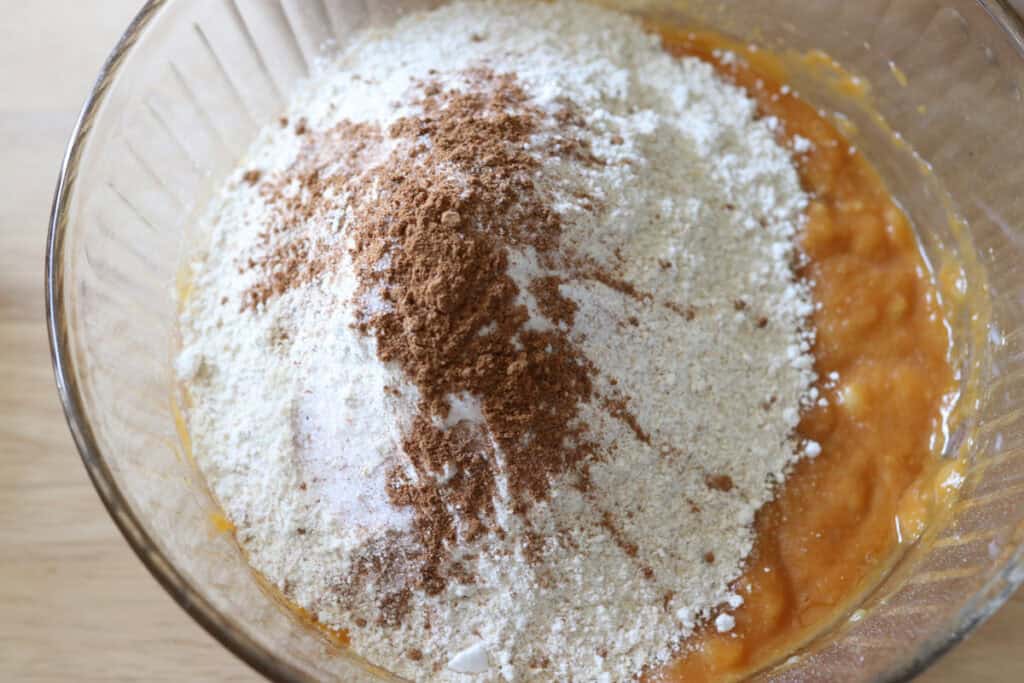 flour and cinnamon in a bowl to make fresh milled pumpkin chocolate chip banana bread