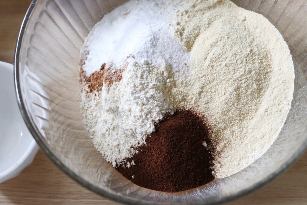 flour and sugar in a bowl to make freshly milled chocolate chip cappuccino muffins