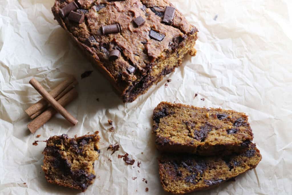 fresh milled pumpkin chocolate chip banana bread with two slices cut out