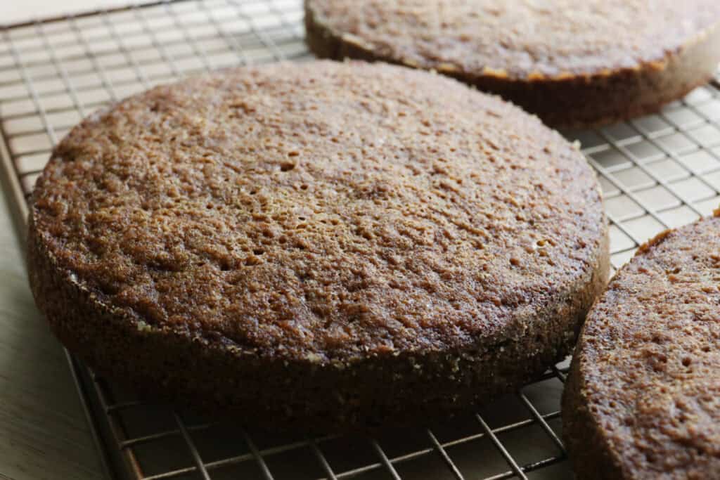 freshly milled carrot cakes cooling on a wire rack