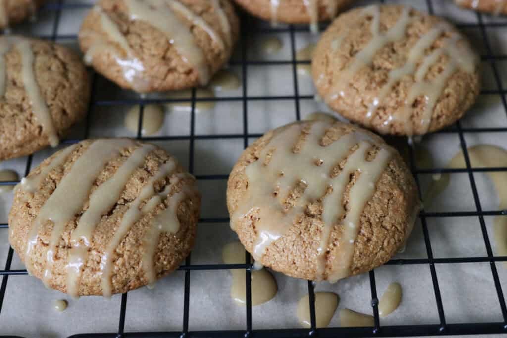 fresh milled maple brown sugar cookies on a wire rack with maple glaze