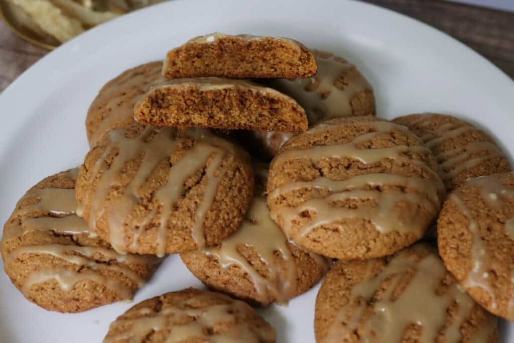 fresh milled maple brown sugar cookies with maple icing on a white plate