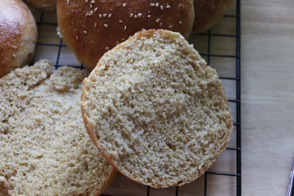 a fresh milled fluffy brioche burger bun cut in half