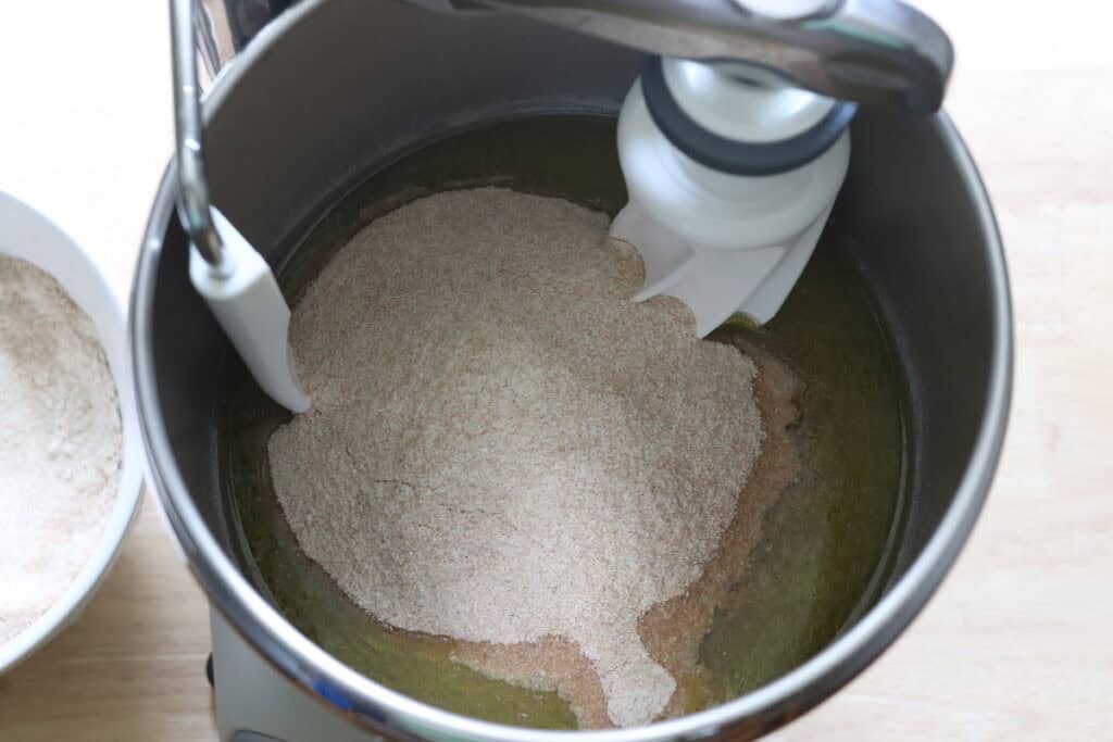 flour in a mixing bowl to make the most delicious fresh milled cinnamon swirl bread