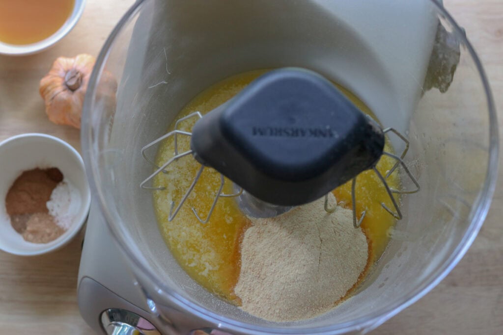 butter and brown sugar in a mixing bowl to make fresh milled apple cider cupcakes
