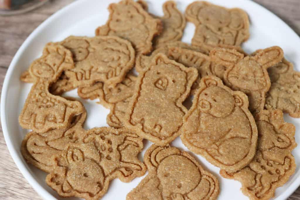 a close up of Homemade Animal Crackers with Fresh Milled Flour on a white plate