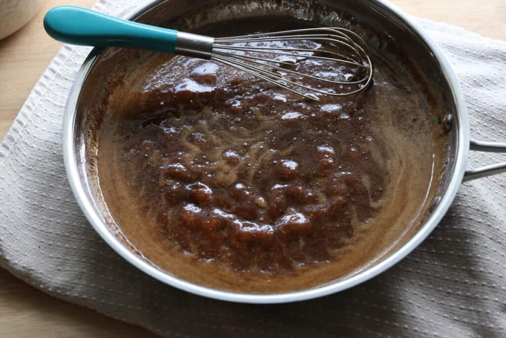 maple syrup, flour, cinnamon, and nutmeg that have been boiled and thickened into a sauce