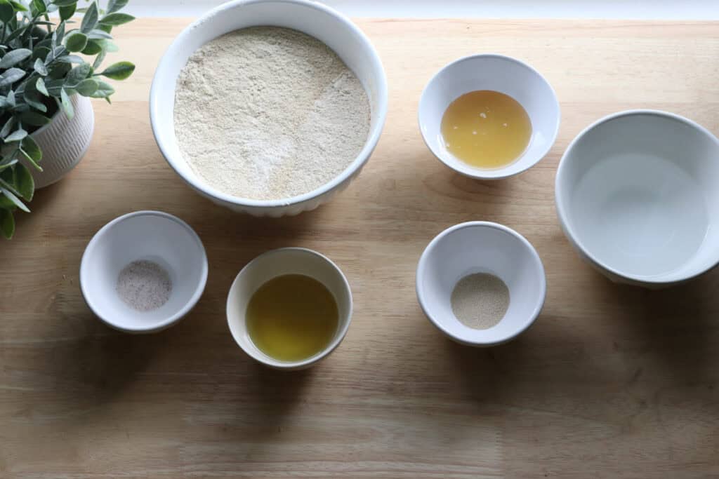 ingredients to make freshly milled parmesan pesto star bread dough