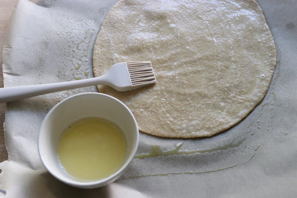 the dough for freshly milled parmesan pesto star bread brushed with egg wash