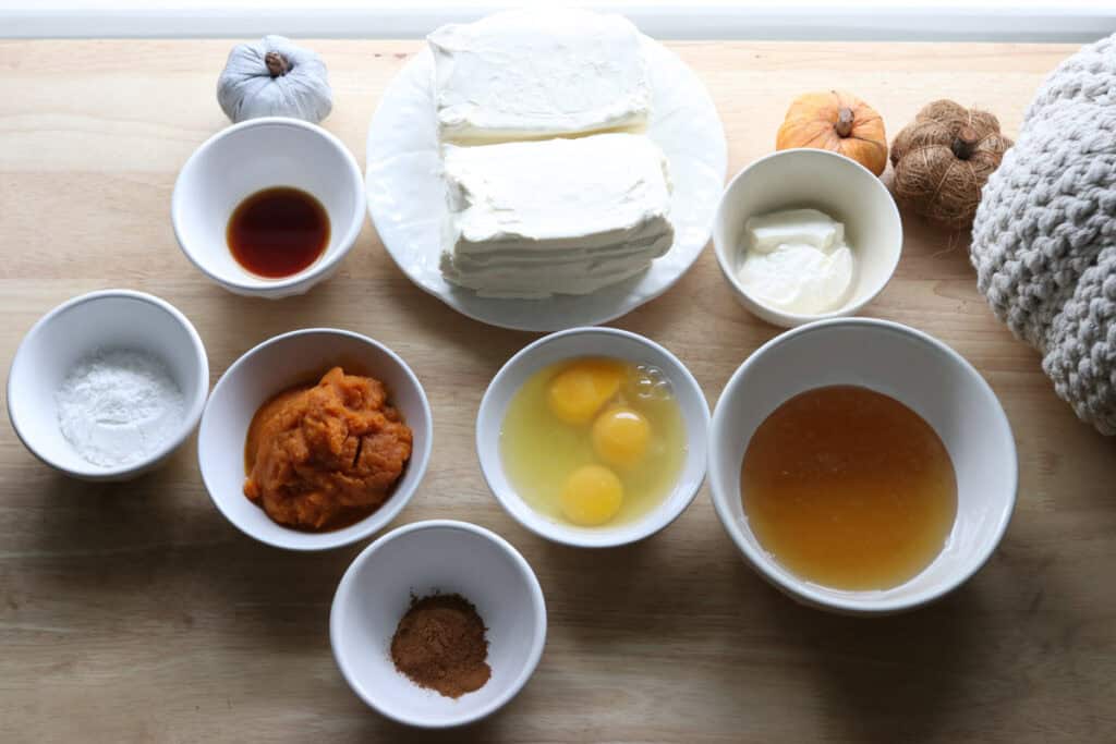 ingredients to make pumpkin cheesecake bars with fresh milled crust