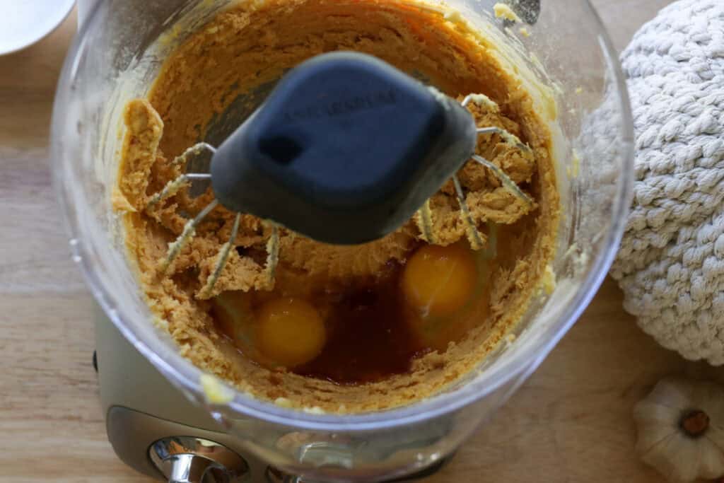 butter, sugar, eggs, and vanilla in a mixing bowl to make Freshly Milled Pumpkin Spice Latte Cake with Frosting
