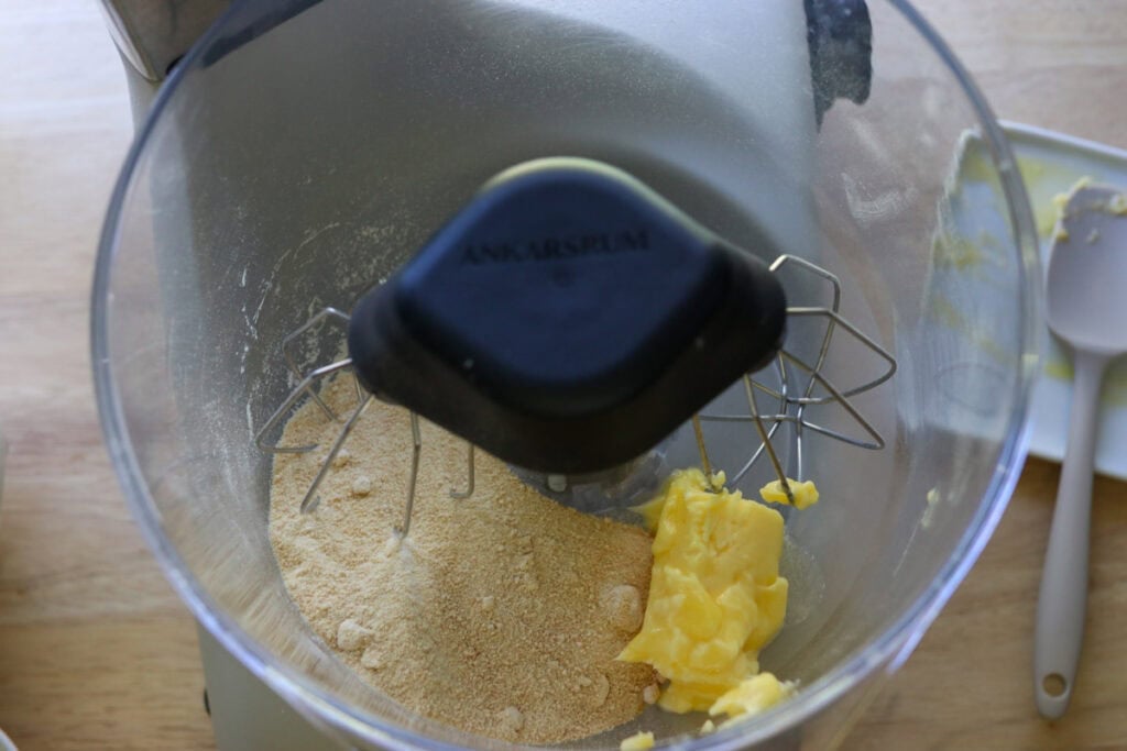 butter and sugar in a mixing bowl to make Fresh Milled Hot Cocoa Cupcakes with Ganache Filling