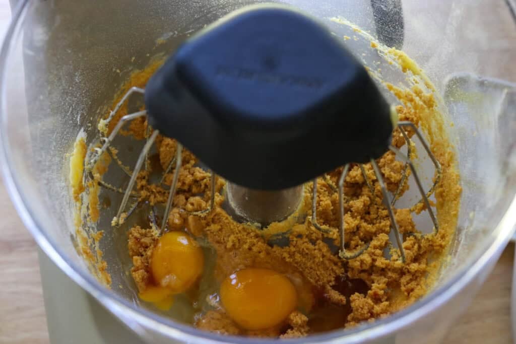 eggs and vanilla added to batter to make Fresh Milled Hot Cocoa Cupcakes with Ganache Filling