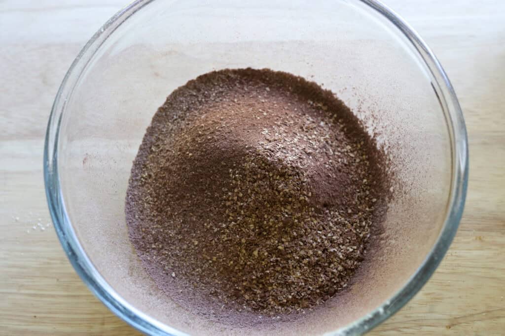 cocoa powder and flour sifted together to make Fresh Milled Hot Cocoa Cupcakes with Ganache Filling
