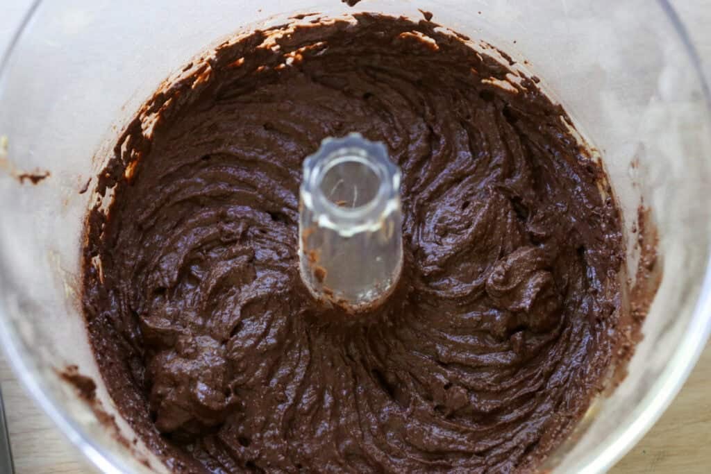 cupcake batter in a mixing bowl to make Fresh Milled Hot Cocoa Cupcakes with Ganache Filling