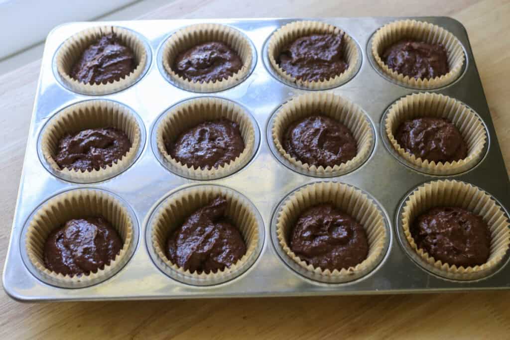 Fresh Milled Hot Cocoa Cupcake batter in a cupcake pan
