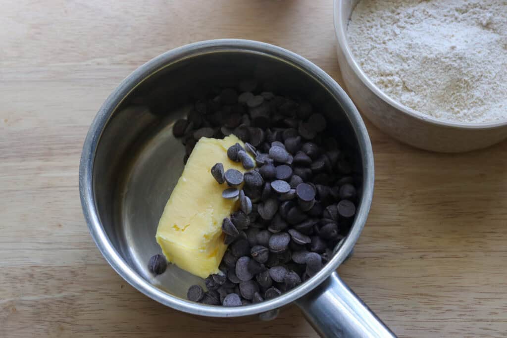 chocolate chips and butter in a saucepan to make freshly milled brownie cookies