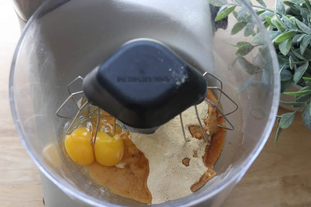 sugar and eggs in a mixing bowl to make freshly milled brownie cookies
