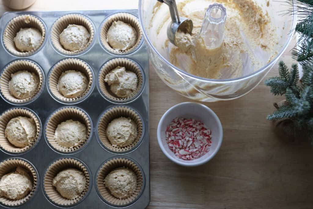 Freshly Milled White Chocolate Peppermint Cupcake batter in a cupcake pan 