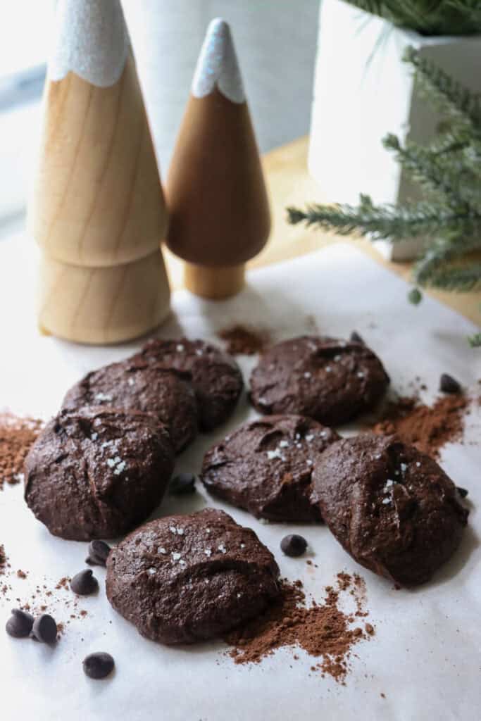 Delicious Brownie Cookies with Freshly Milled Flour with christmas trees in the background
