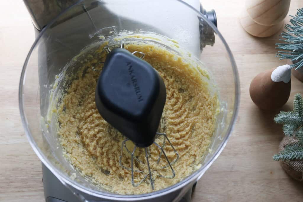 butter and maple syrup that have been creamed in a mixing bowl to make The Best Fresh Milled Healthy Christmas Sugar Cookies