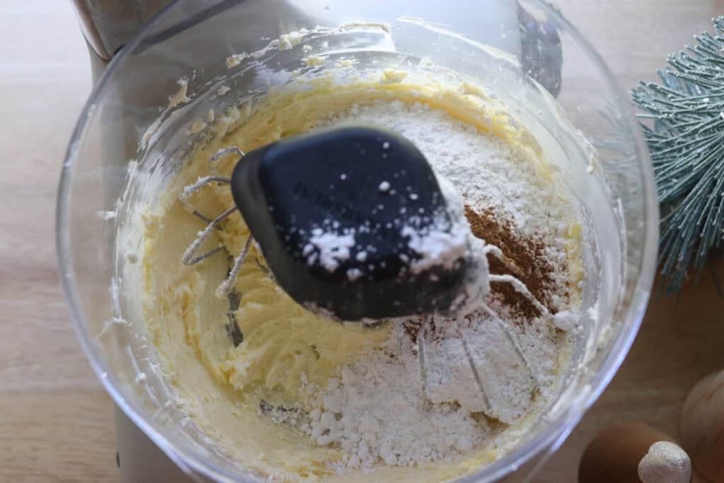 powdered sugar and spices to make the frosting for fresh milled eggnog cupcakes