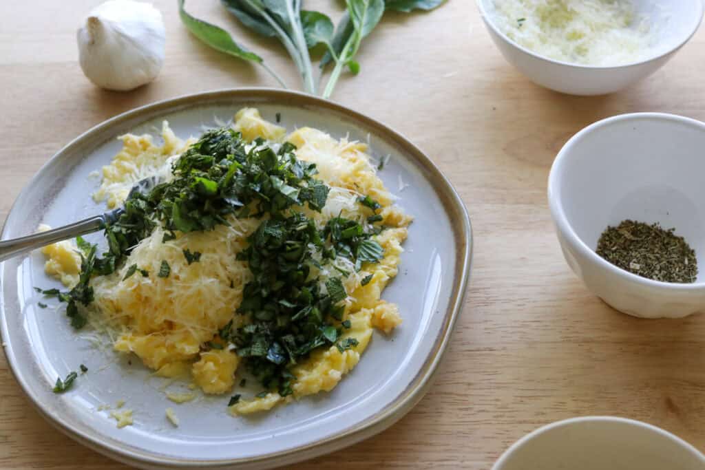 fresh herbs and butter to make garlic butter for the Fresh Milled Christmas Tree Garlic and Herb Bread