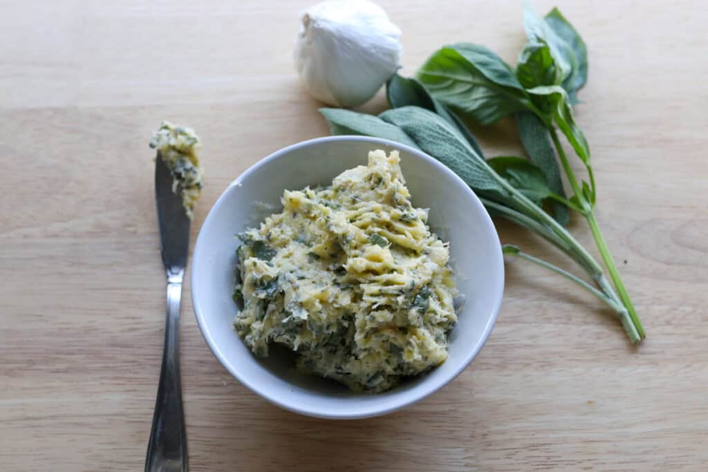 garlic and herb butter in a bowl for the Fresh Milled Christmas Tree Garlic and Herb Bread