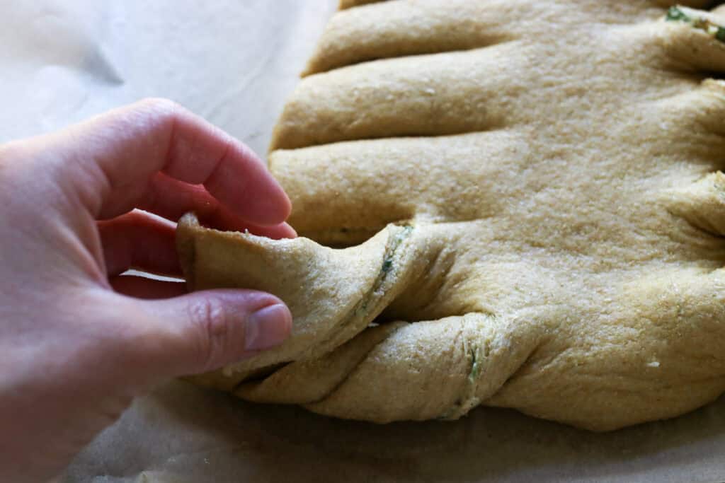 twisting the branches for Fresh Milled Christmas Tree Garlic and Herb Bread