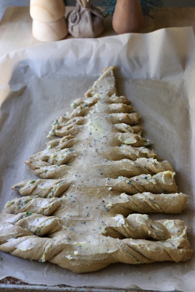 Fresh Milled Christmas Tree Garlic and Herb Bread that has been covered in garlic herb butter