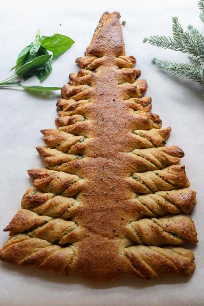 Fresh Milled Christmas Tree Garlic and Herb Bread that has been baked on white parchment