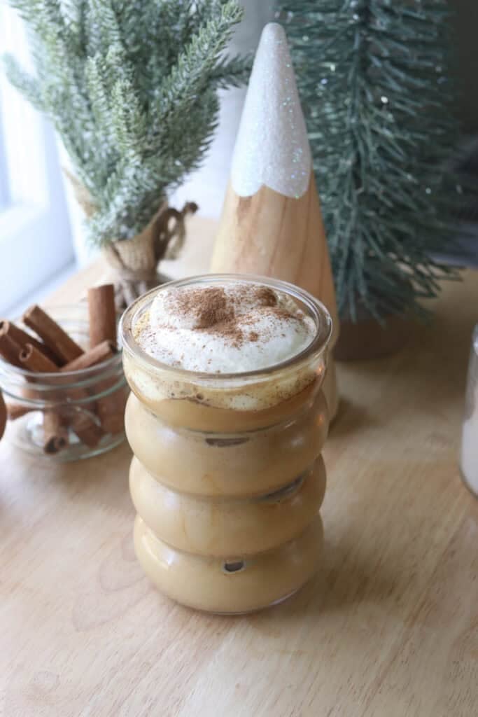 iced coffee with Delicious Healthier Teddy Graham Coffee Creamer in glass with cinnamon sticks