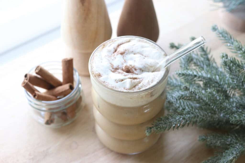 iced coffee with Delicious Healthier Teddy Graham Coffee Creamer and whipped cream in a glass with a straw